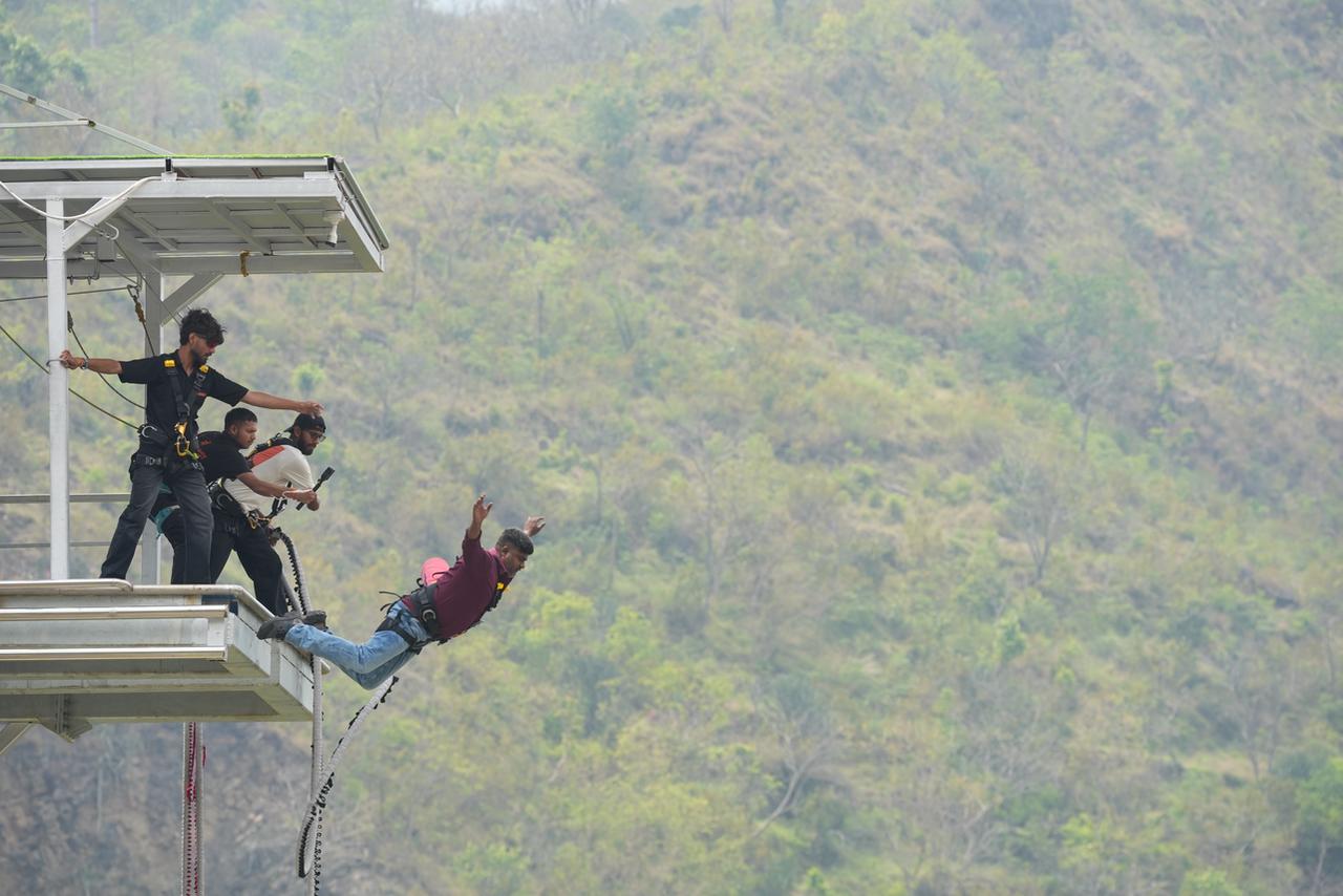 Guest on the Maa Ganga Bungy platform with valley views